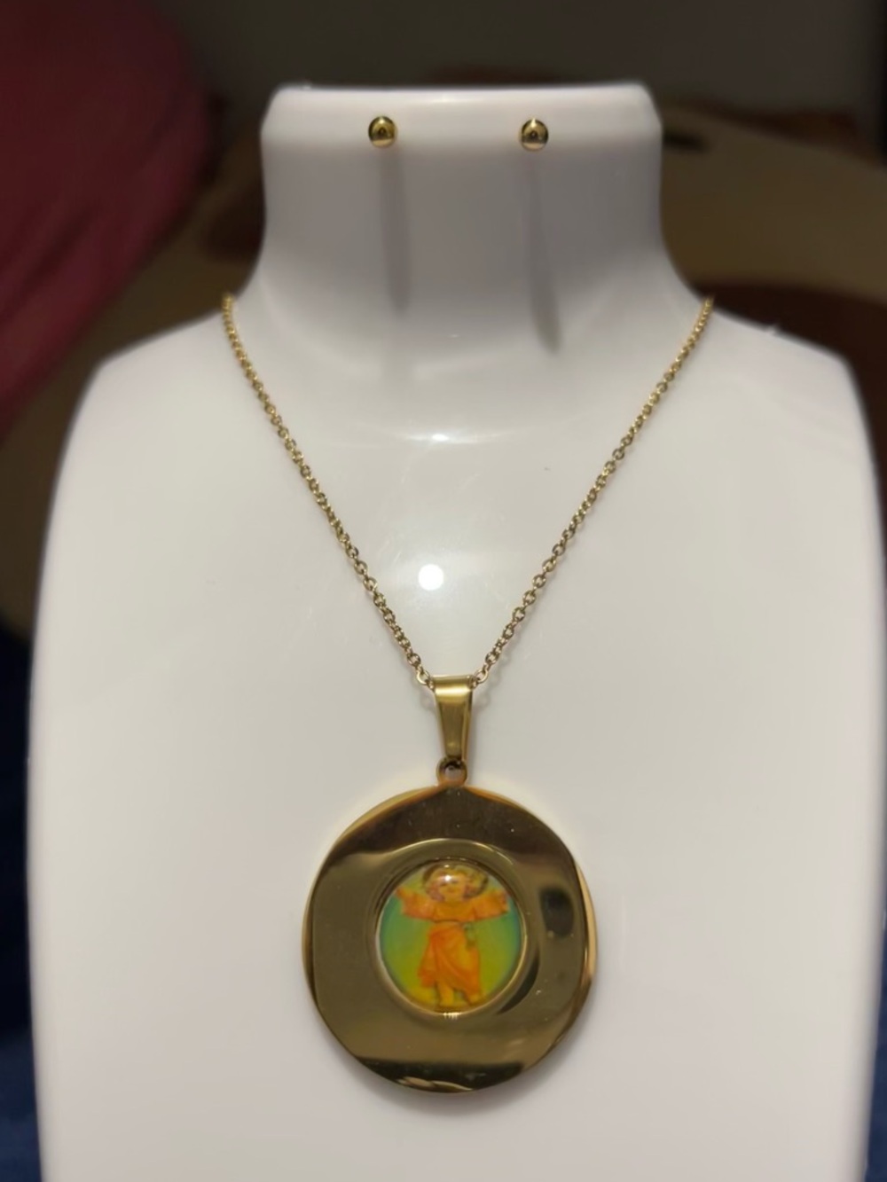 Gold Tone Round Pendant Necklace with Orange Accent